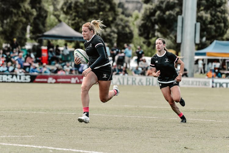 Caitlin Stanley (left) is already turning heads just 6 months into her rugby journey. Picture: ACT Brumbies